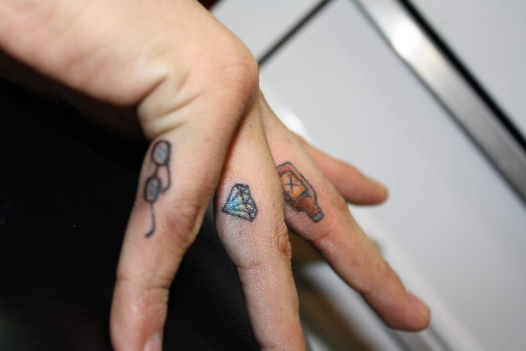 Animal Tattoo on Fingers