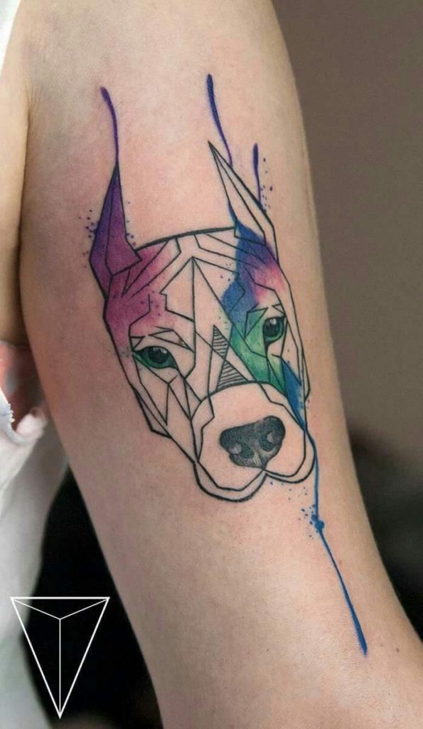 dog tattoos on arm with watercolor